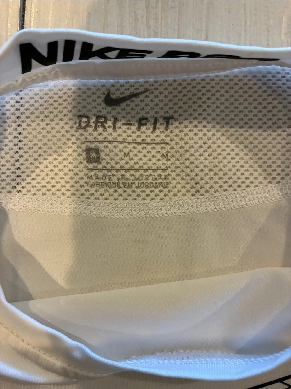 Nike White Short-Sleeve Dri-FIT Training Tee with Black Swoosh